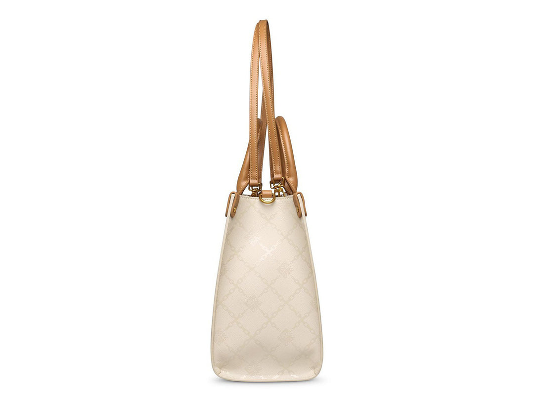 Bolso de hombro Steve Madden color hueso con detalles y asas en tono camel, diseño estructurado con relieve.