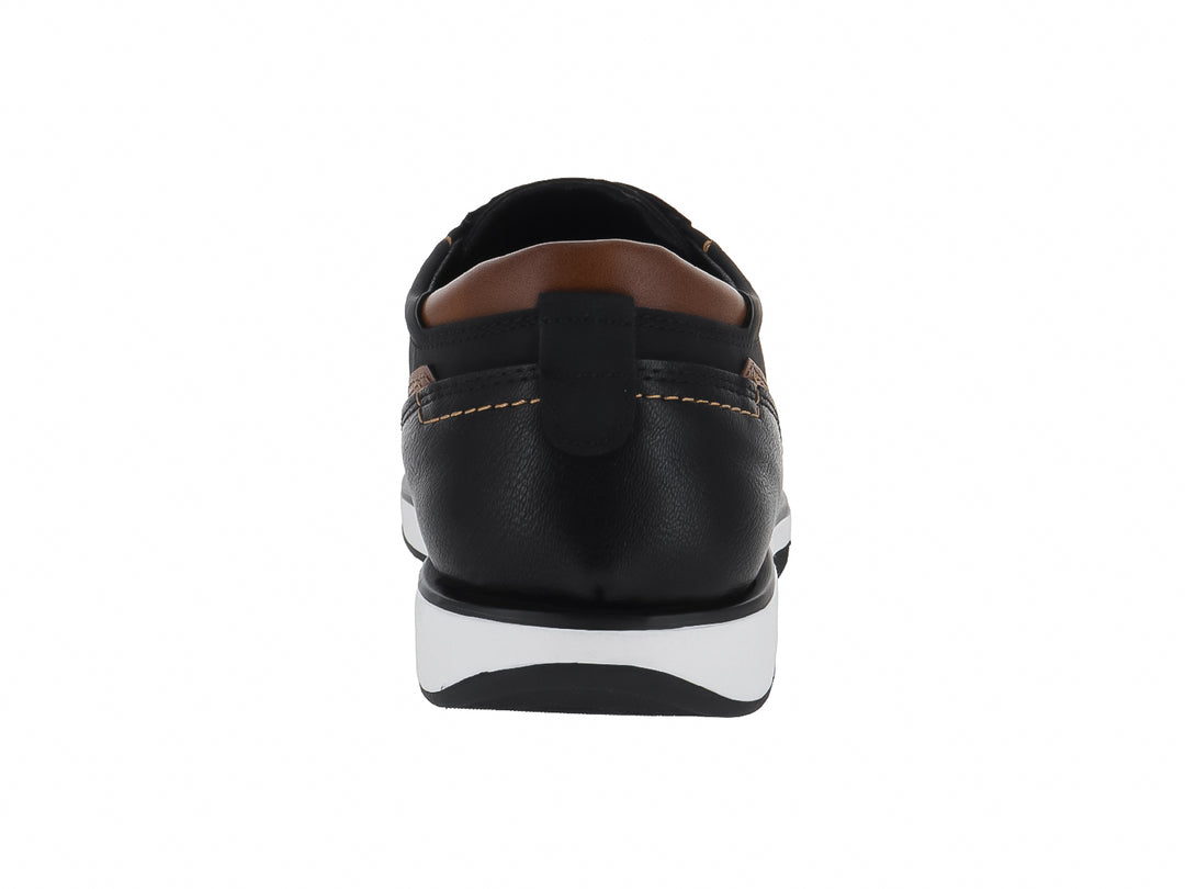 Zapato casual Clasben color negro con suela blanca y detalles en color café.