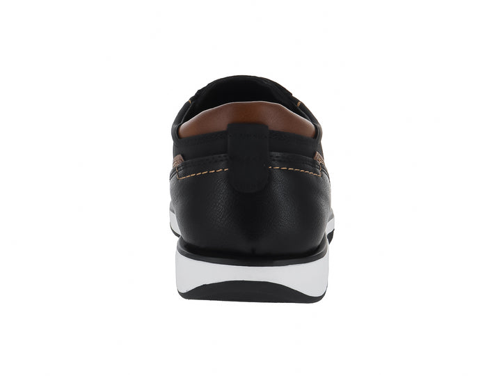 Zapato casual Clasben color negro con suela blanca y detalles en color café.