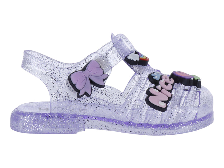 Sandalias infantiles color morado con glitter, decoradas con un moño y letras que dicen &