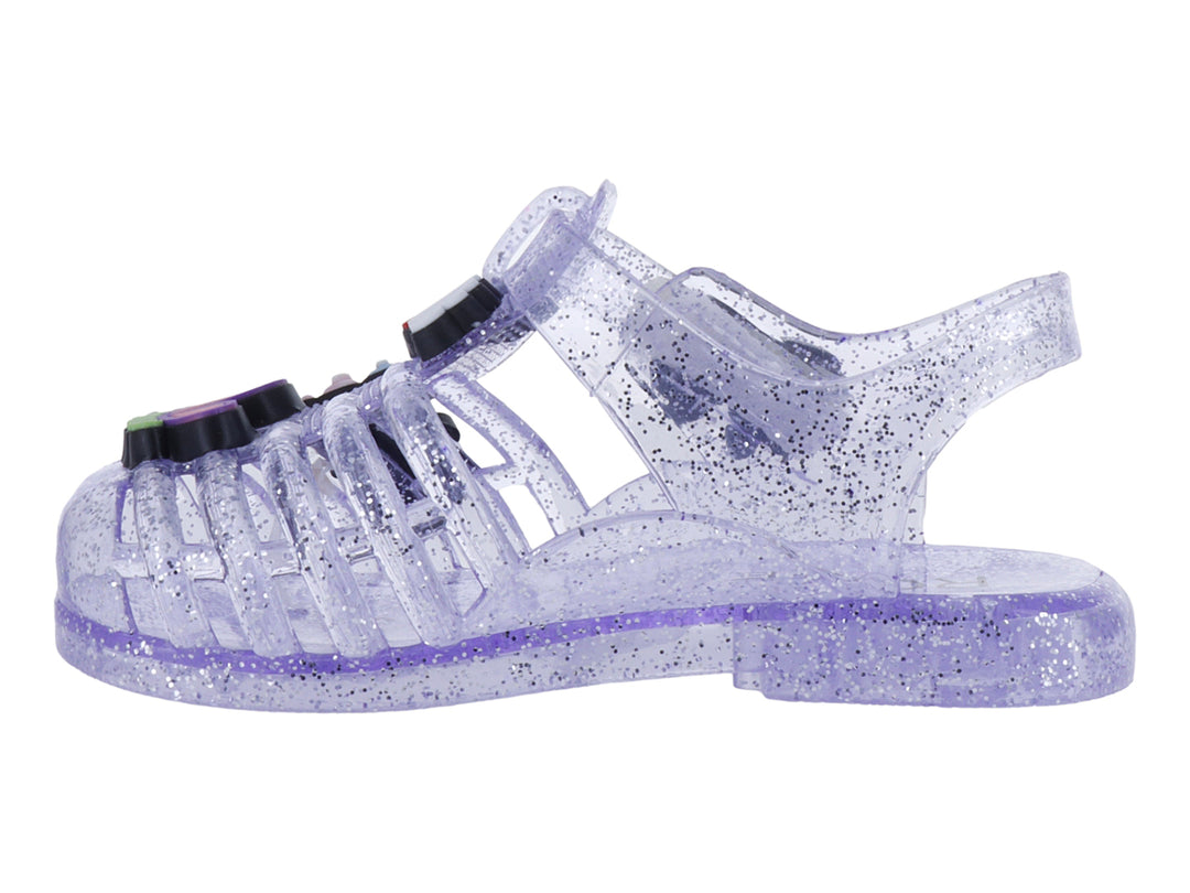 Sandalias infantiles color morado con glitter, decoradas con un moño y letras que dicen &