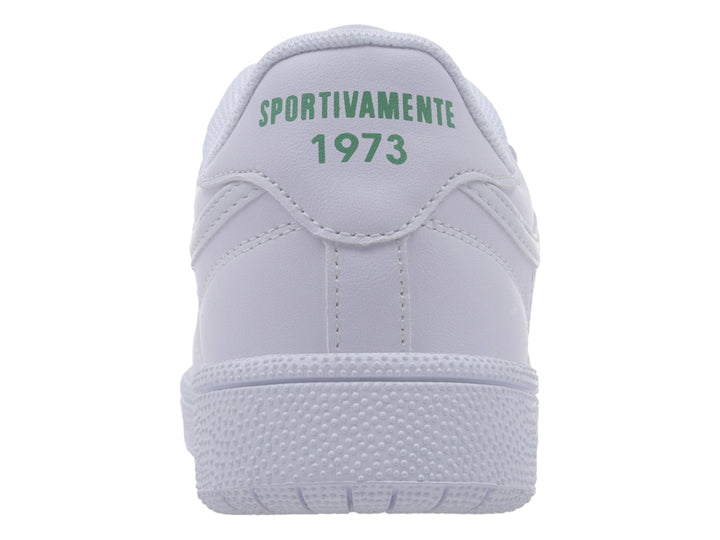 Tenis deportivos Lotto color blanco con detalles en verde menta y suela blanca.