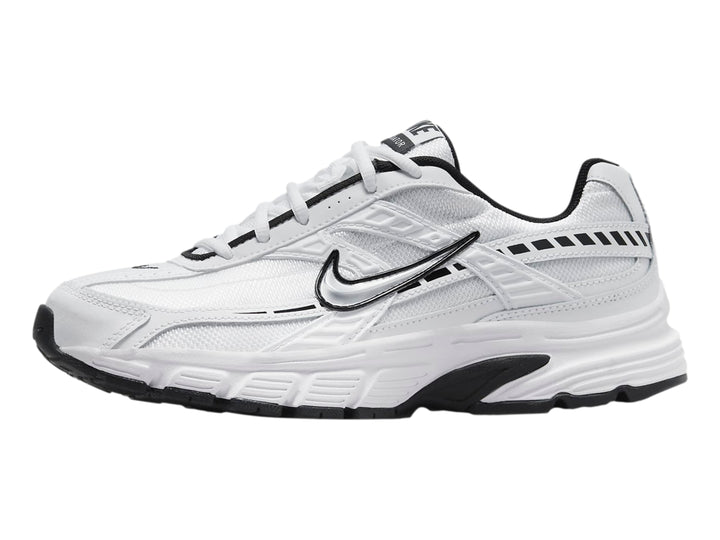 Tenis Nike Initiator blancos con detalles en negro y plata para mujer.