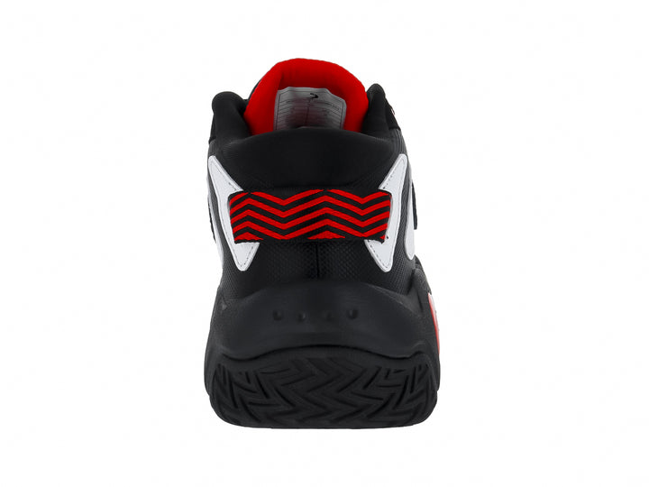Tenis de baloncesto SHAQ en colores negro, blanco y rojo con suela robusta.