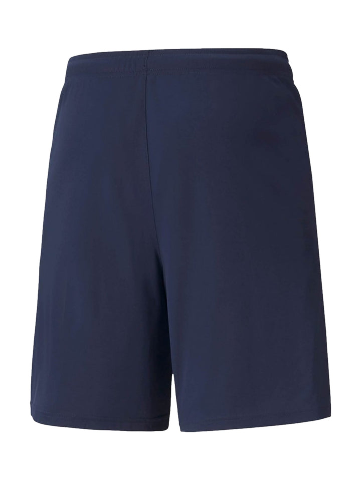 Shorts deportivos PUMA color azul marino con franja blanca lateral y logotipo blanco en la pierna izquierda.