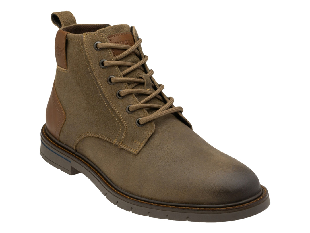 Bota casual de cuero color arena con detalles en café y suela oscura.