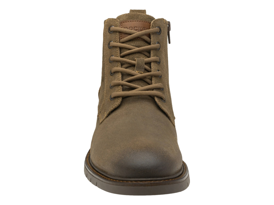 Bota casual de cuero color arena con detalles en café y suela oscura.