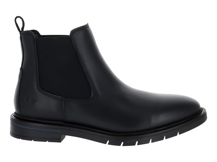 Botas Chelsea negras de cuero con paneles elásticos laterales y suela con detalle en azul.