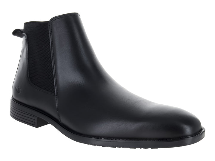 Bota Chelsea de cuero color negro para hombre con paneles laterales elásticos.