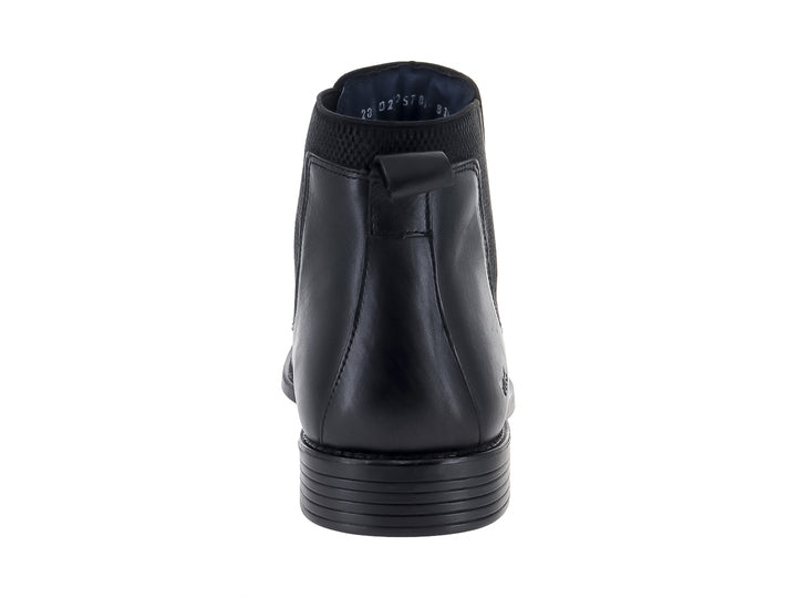 Bota Chelsea de cuero color negro para hombre con paneles laterales elásticos.