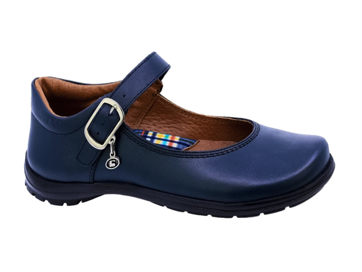 Zapato escolar azul marino para niña con correa y hebilla plateada.