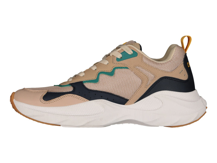 Tenis deportivos Charly en colores beige y marino con suela blanca gruesa y detalles en verde.