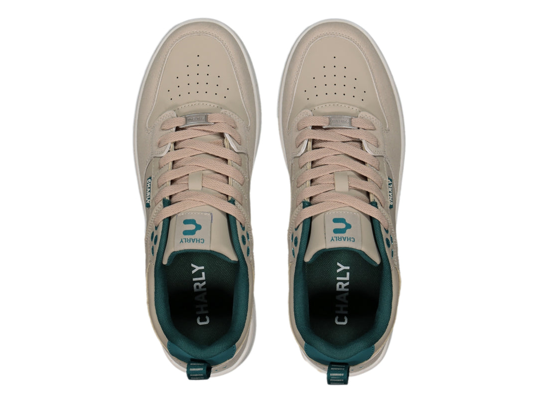 Tenis Charly color beige con detalles en verde azulado y suela blanca para deporte o uso casual.