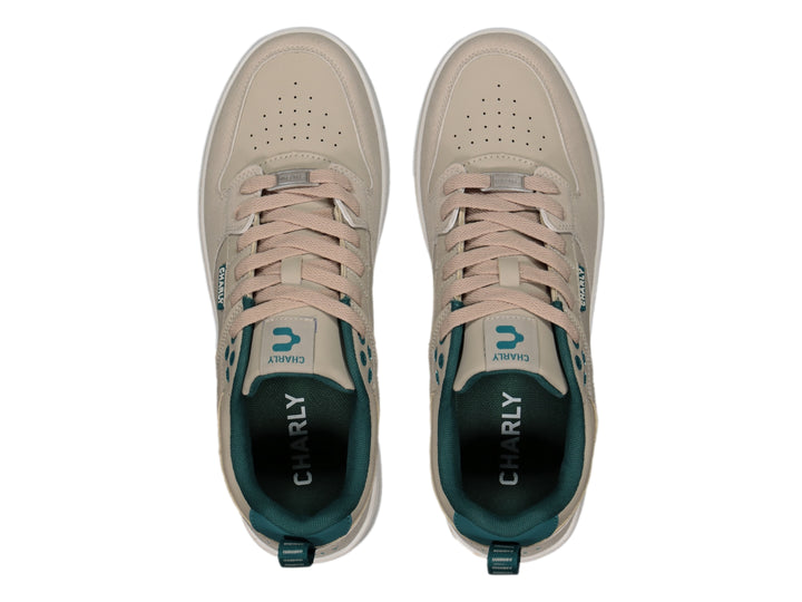 Tenis Charly color beige con detalles en verde azulado y suela blanca para deporte o uso casual.