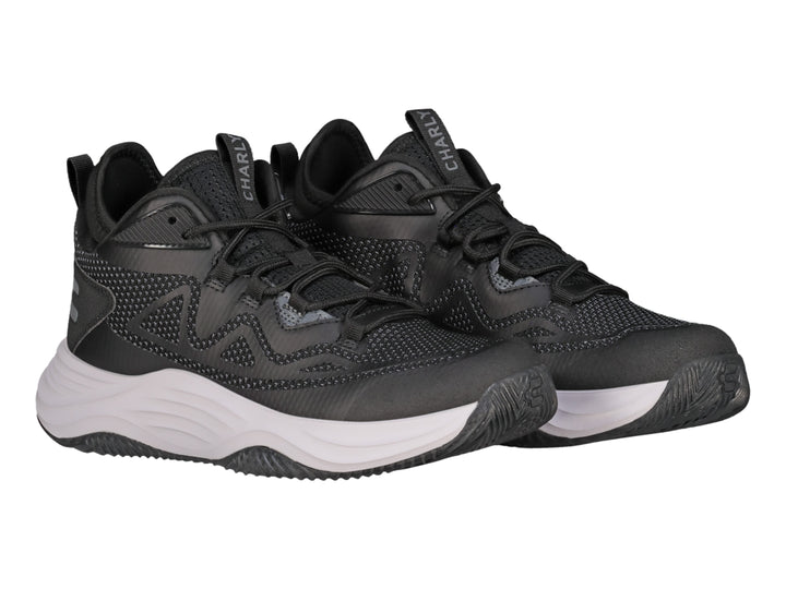 Tenis de baloncesto Charly color negro con suela blanca y detalles en malla gris.
