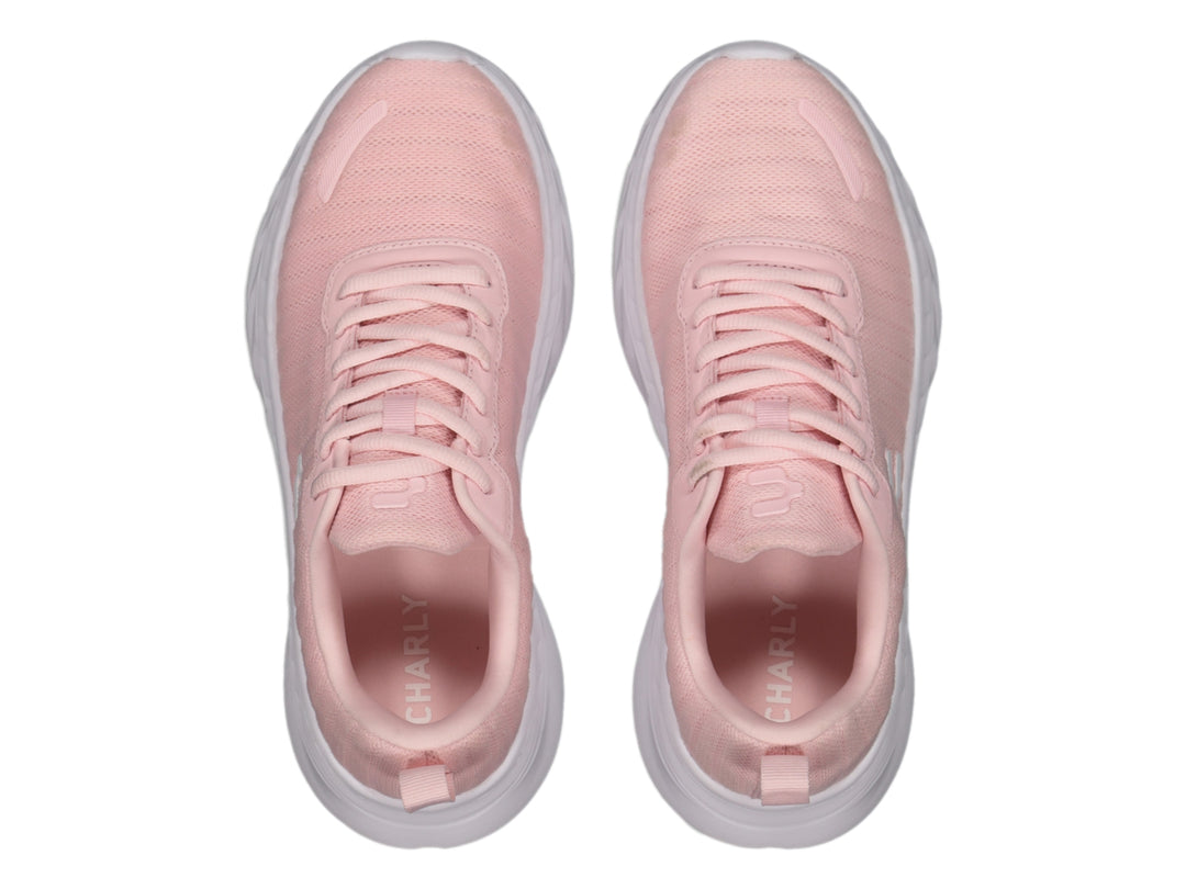 Tenis deportivos Charly en color rosa con suela blanca y agujetas coordinadas.