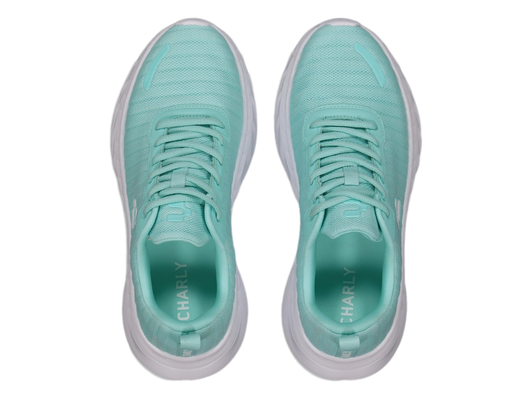 Tenis deportivos Charly en color aqua con suela blanca.