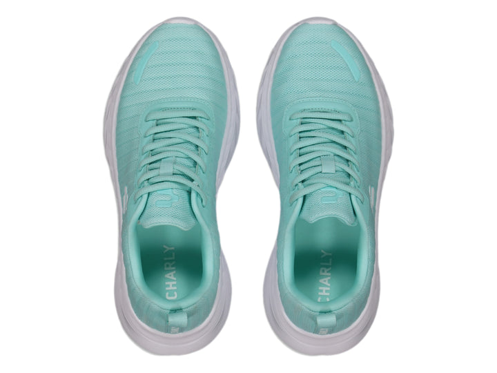 Tenis deportivos Charly en color aqua con suela blanca.