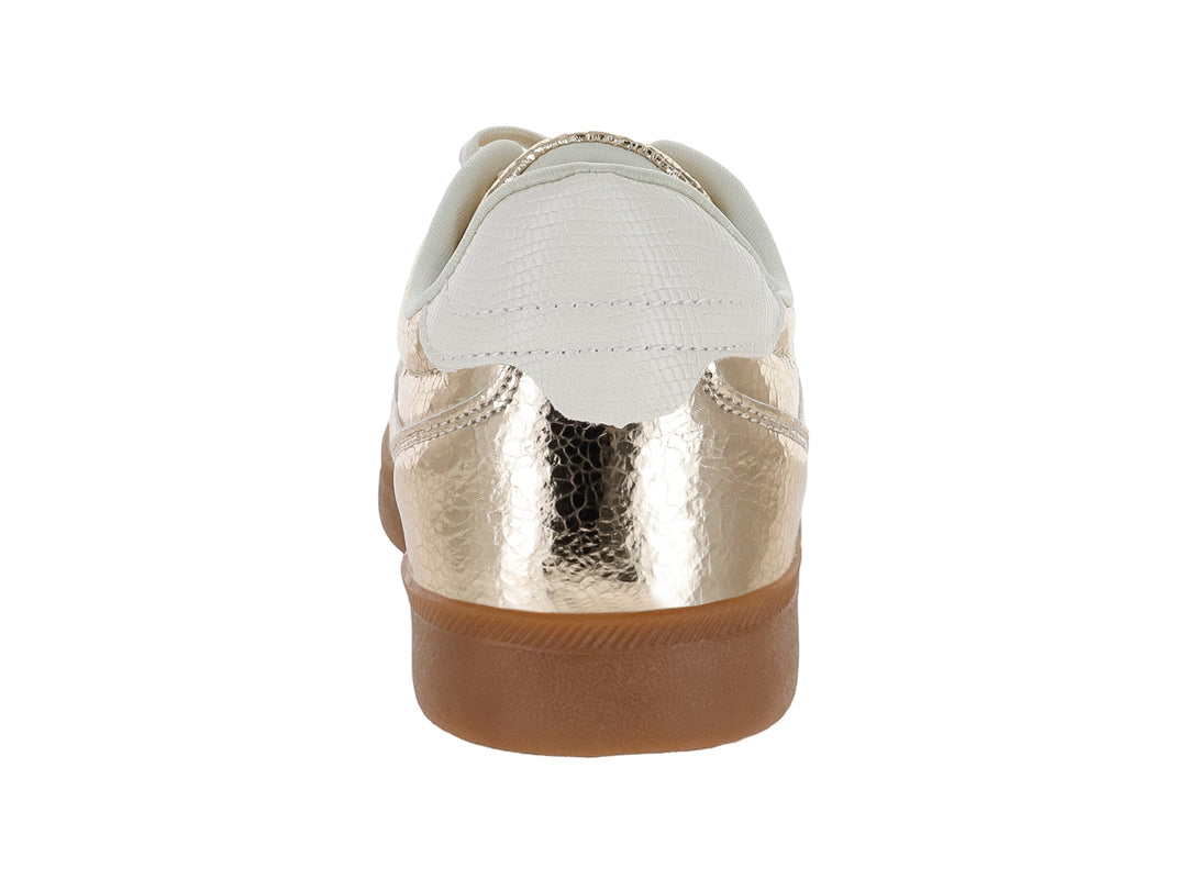 Tenis Clasben Altair en color oro metálico con detalles en blanco y suela café.