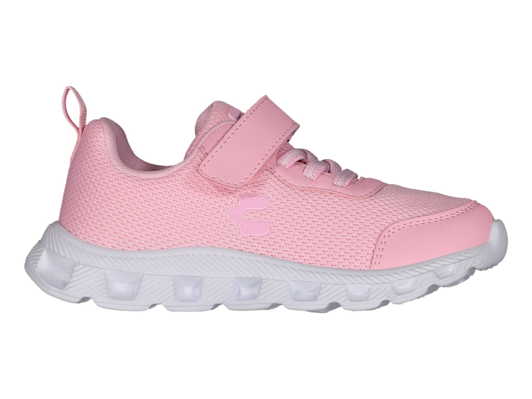 Tenis deportivos color rosa con suela blanca y cierre de cinta adhesiva.
