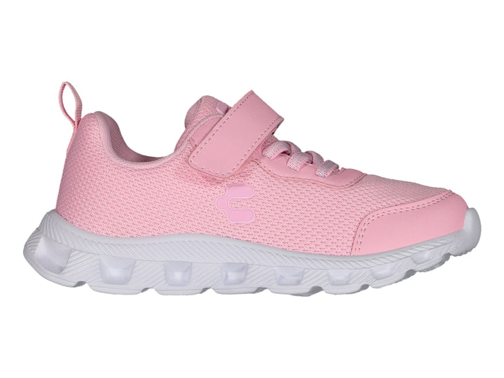Tenis deportivos color rosa con suela blanca y cierre de cinta adhesiva.