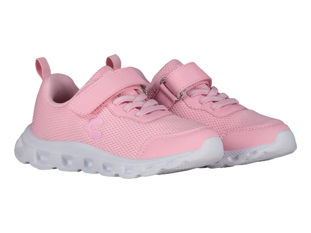 Tenis deportivos color rosa con suela blanca y cierre de cinta adhesiva.