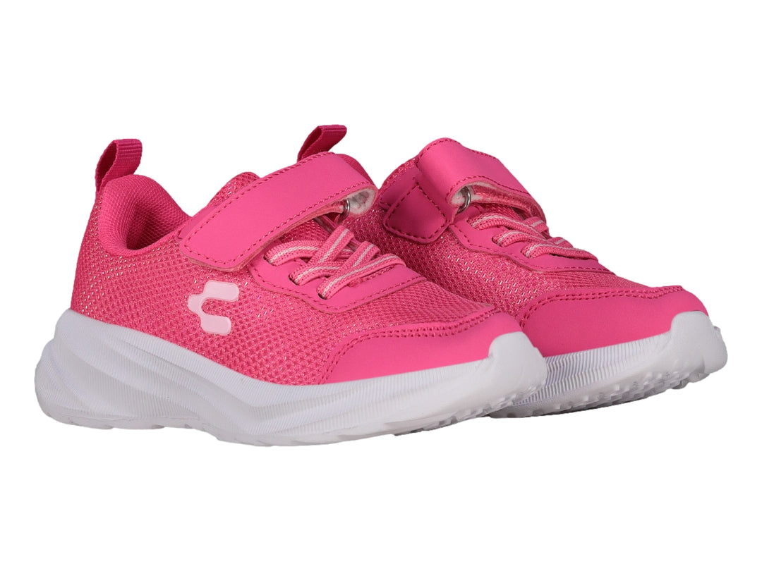 Tenis deportivos infantiles color rosa fucsia con suela blanca y cierre de velcro.