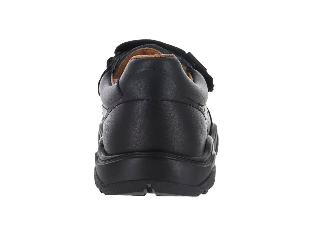 Zapato casual color negro para niño o niña con cierre de dos correas de velcro y suela robusta.