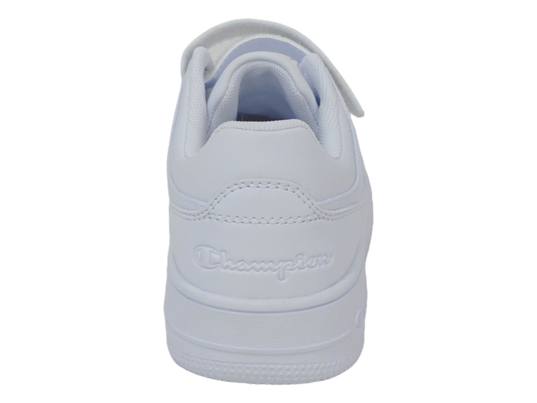 Tenis deportivos Champion color blanco para niño o niña con cierre de velcro y agujetas.