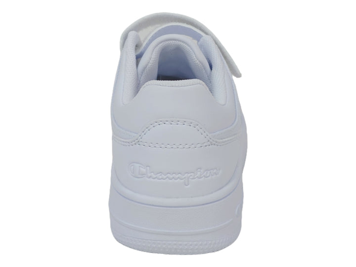 Tenis deportivos Champion color blanco para niño o niña con cierre de velcro y agujetas.