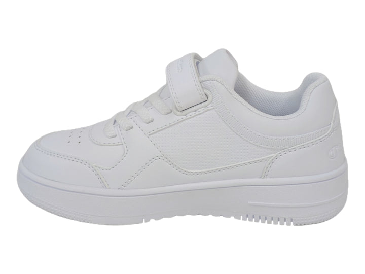 Tenis deportivos Champion color blanco para niño o niña con cierre de velcro y agujetas.