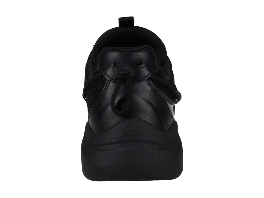 Tenis deportivos Champion color negro con suela gruesa y detalles en malla y material sintético.