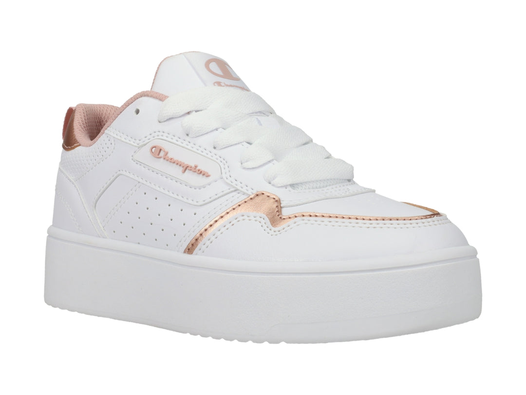 Tenis Champion blancos de plataforma con detalles en color oro rosa.