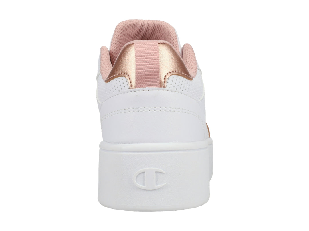 Tenis Champion blancos de plataforma con detalles en color oro rosa.