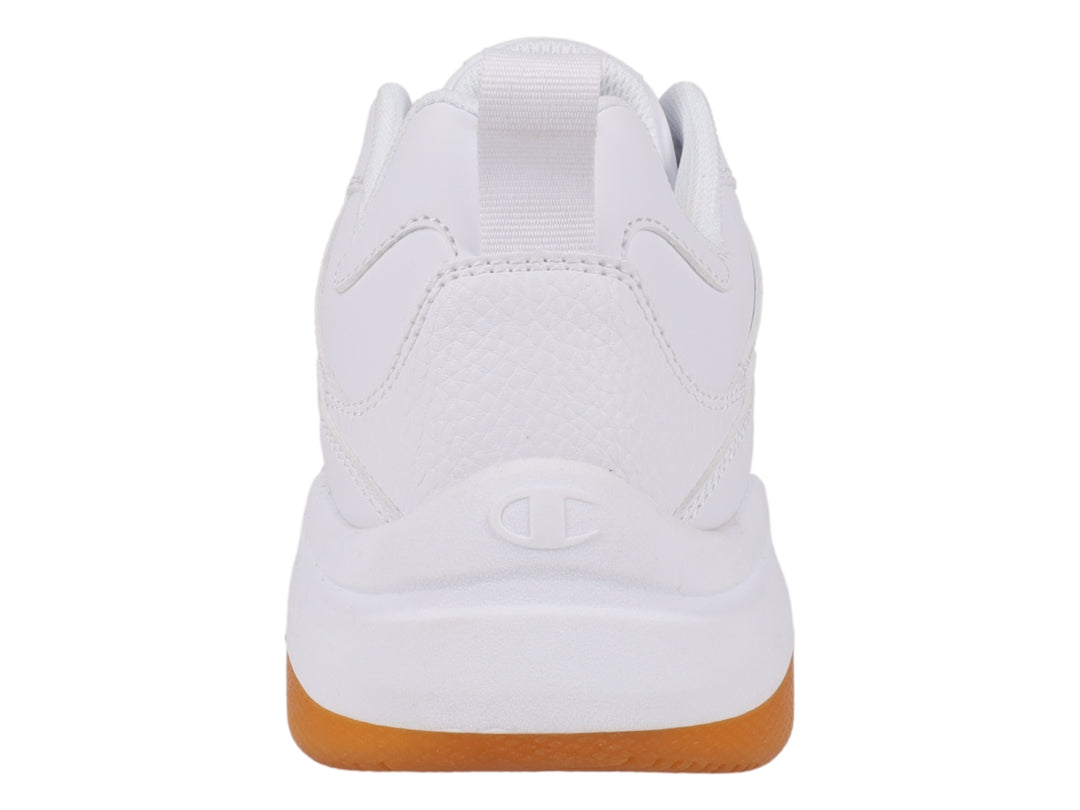 Tenis Champion blancos con suela de goma color caramelo y diseño deportivo.