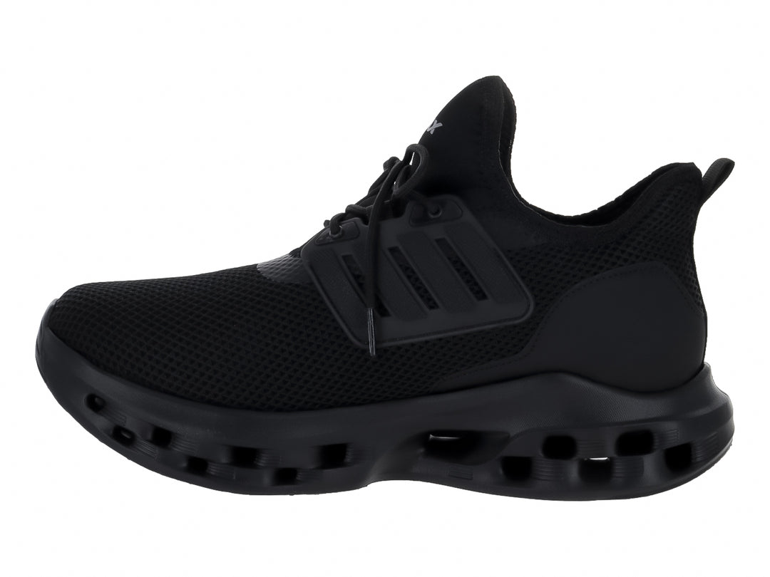 Tenis deportivos Andrax color negro con suela gruesa perforada y tejido de malla.