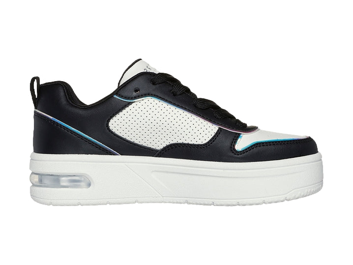 Tenis Skechers color negro y blanco con detalles en azul, suela blanca de plataforma y cámara de aire visible.