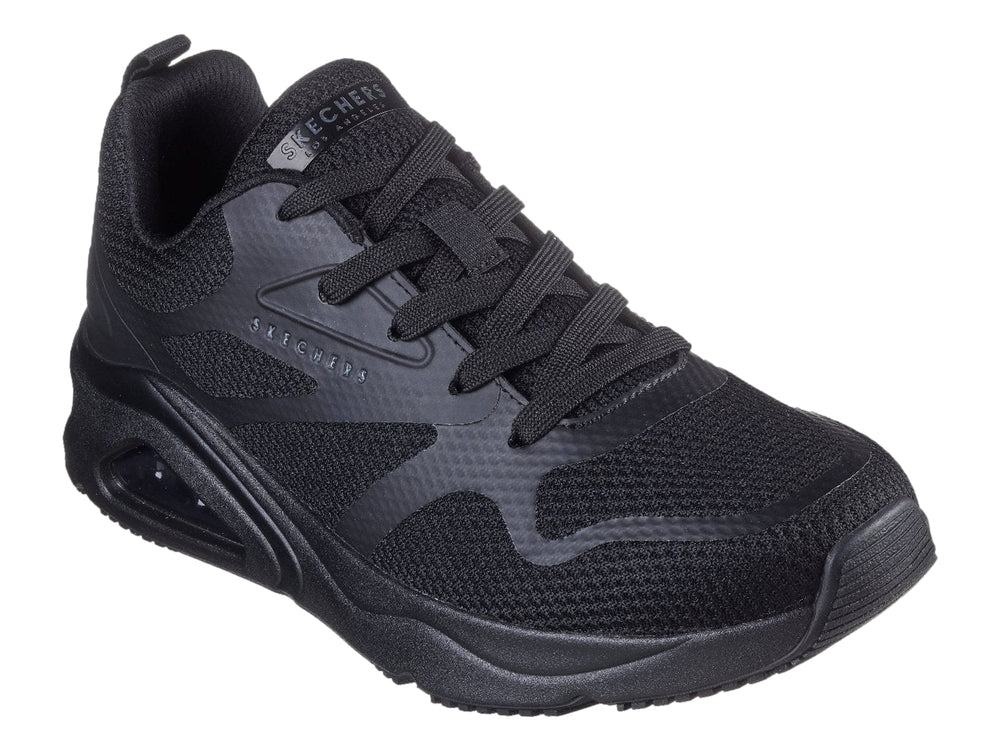 Tenis deportivos Skechers color negro con suela de amortiguación de aire visible.