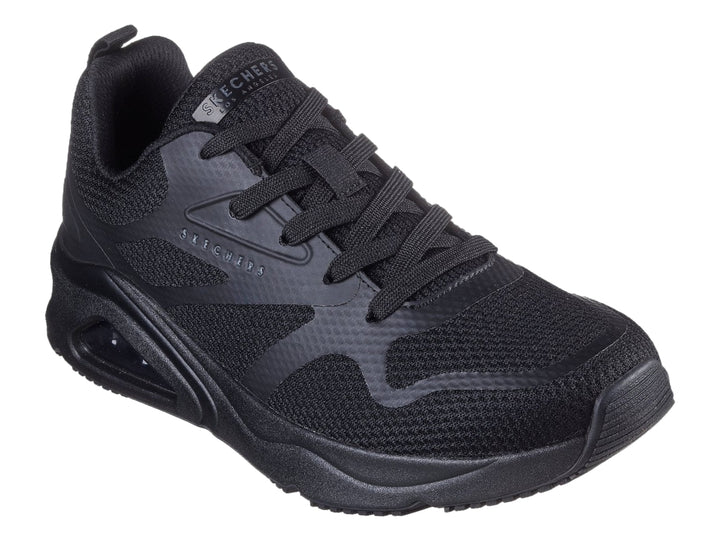 Tenis deportivos Skechers color negro con suela de amortiguación de aire visible.