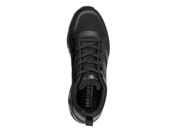 Tenis deportivos Skechers color negro con suela de amortiguación de aire visible.