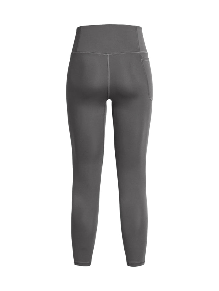 Leggings deportivos Under Armour color gris oscuro, ajustados al tobillo.