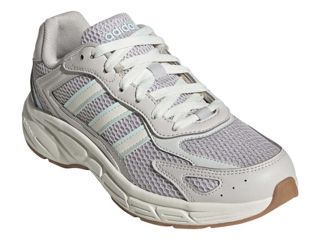 Tenis Adidas Eclyptix 2000 color gris lavanda y blanco con detalles en azul claro y suela gruesa.