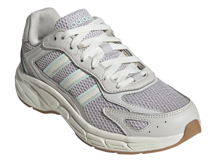 Tenis Adidas Eclyptix 2000 color gris lavanda y blanco con detalles en azul claro y suela gruesa.