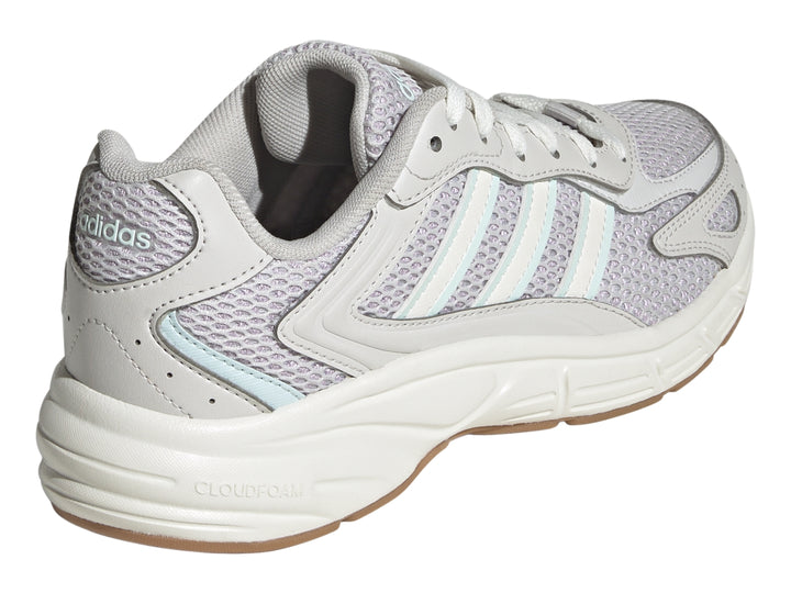 Tenis Adidas Eclyptix 2000 color gris lavanda y blanco con detalles en azul claro y suela gruesa.