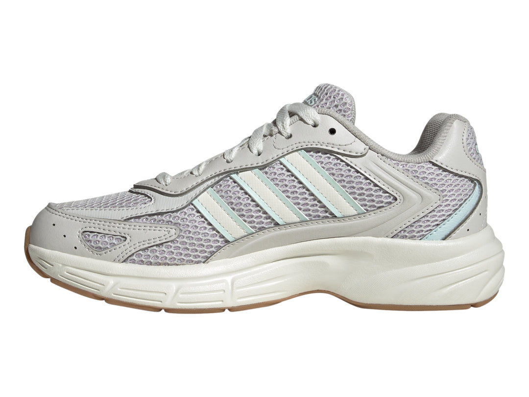 Tenis Adidas Eclyptix 2000 color gris lavanda y blanco con detalles en azul claro y suela gruesa.