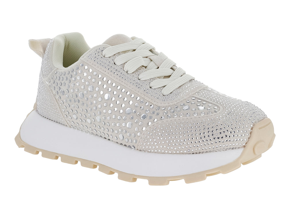 Tenis color beige con cristales brillantes y suela blanca.