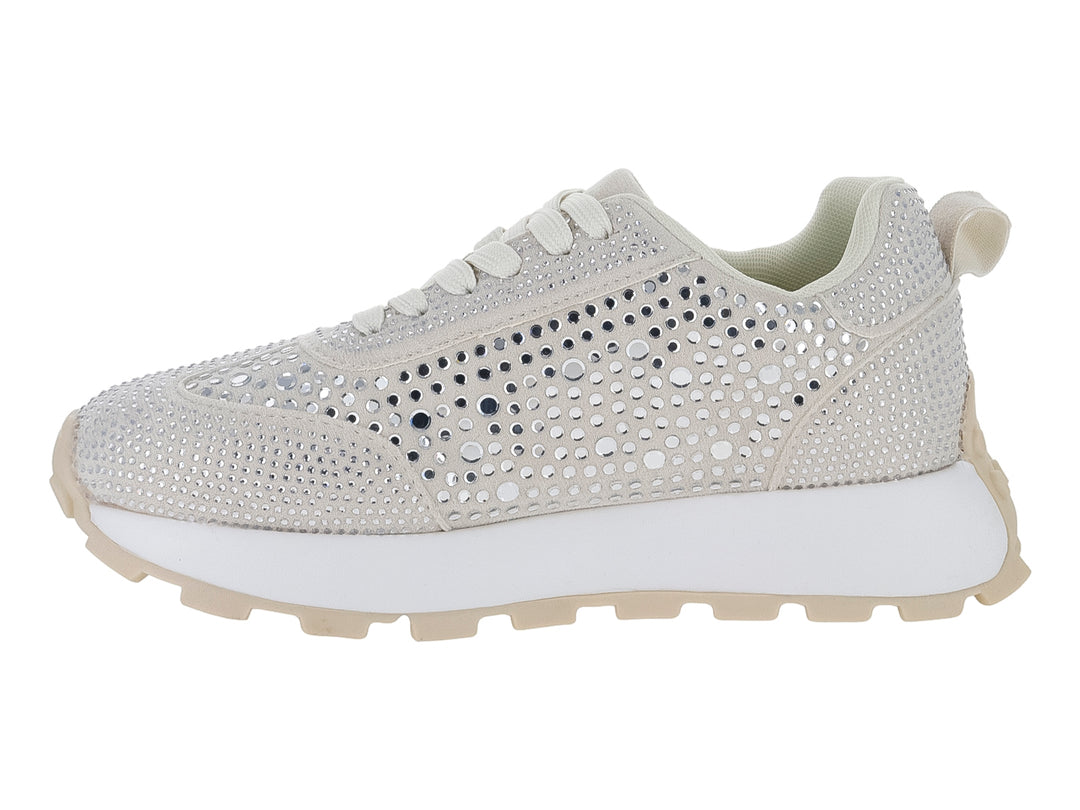 Tenis color beige con cristales brillantes y suela blanca.
