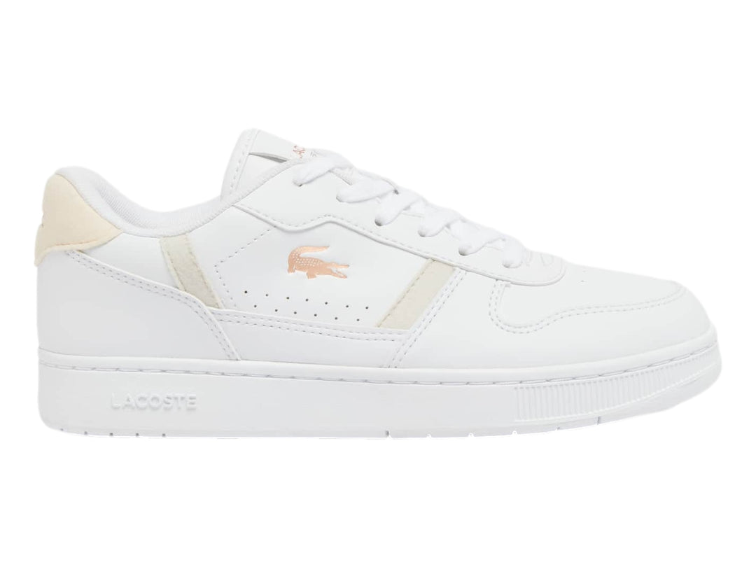 Tenis Lacoste blancos con detalles en rosa claro y suela blanca.