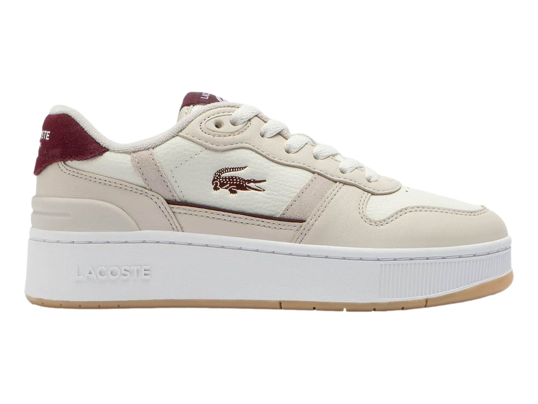 Tenis Lacoste blancos con detalles en color guinda y suela de plataforma color goma.