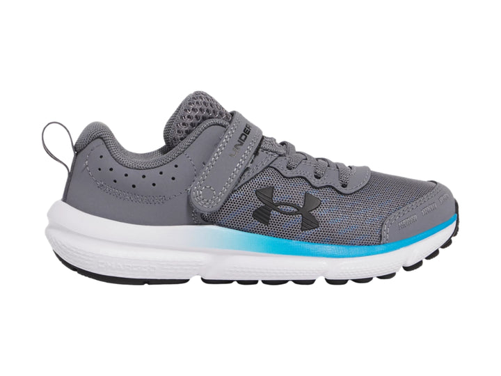 Tenis deportivos Under Armour color gris con suela blanca y detalle azul, cierre de velcro.